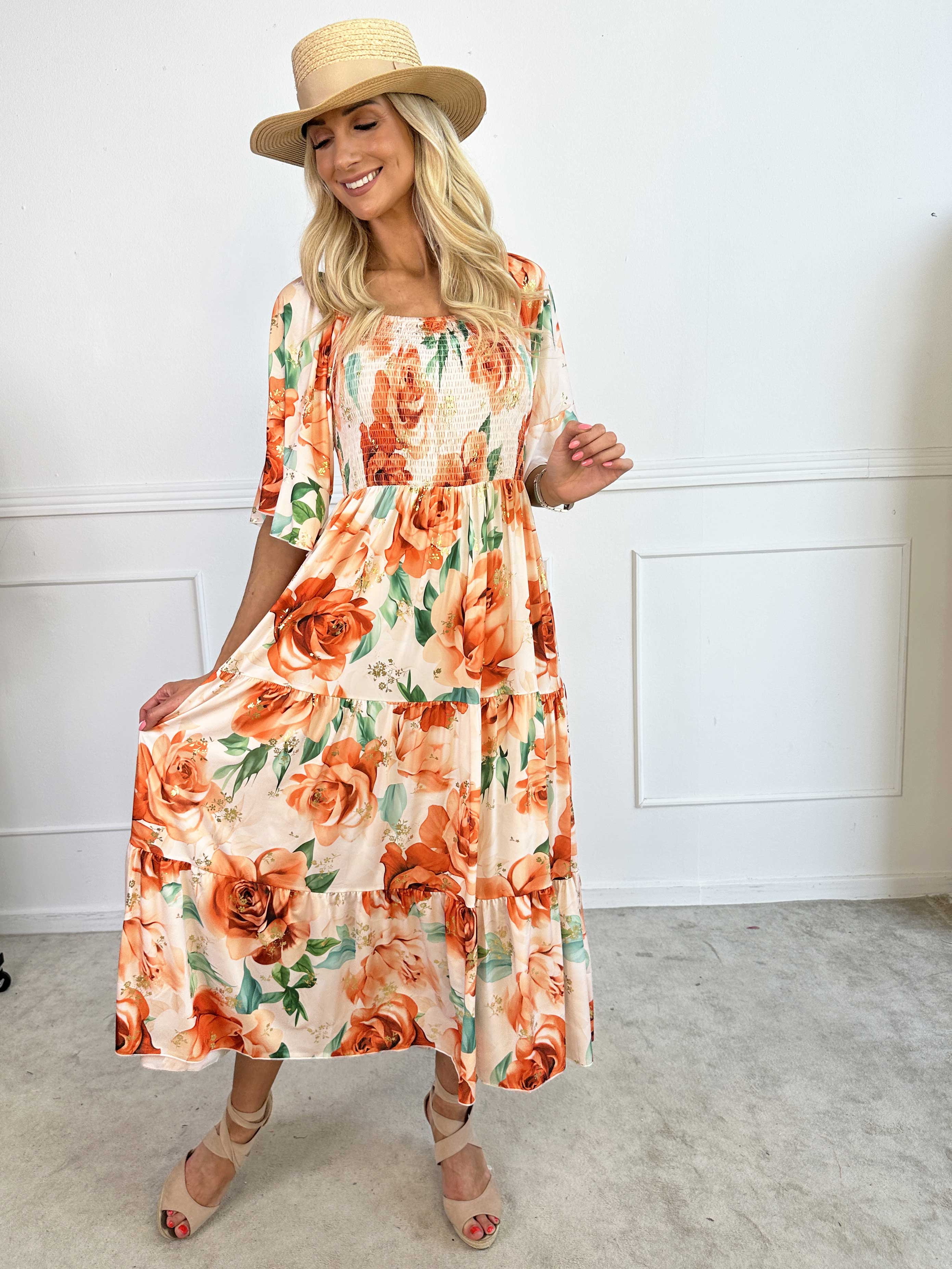 Elna Flower - Blomstret elastisk kjole med smock over brystet